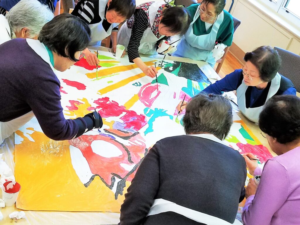 Seniors practice in painting class