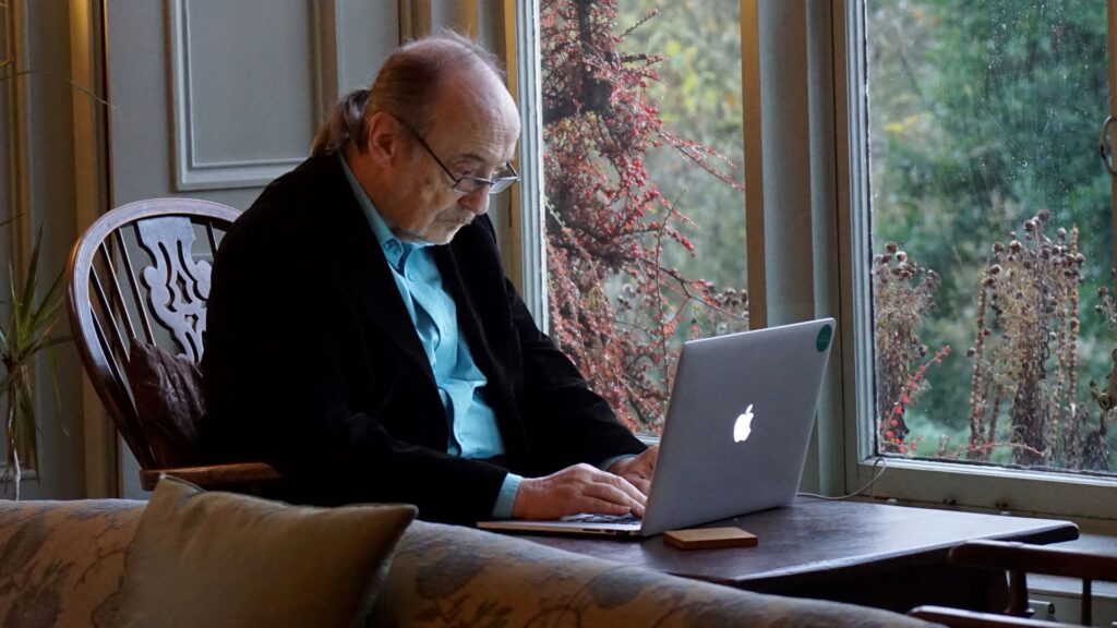 Senior man using his computer
